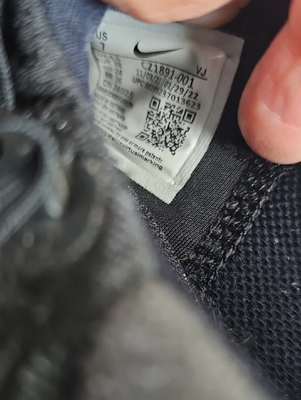 Nike Black Athletic Shoes with White Swoosh